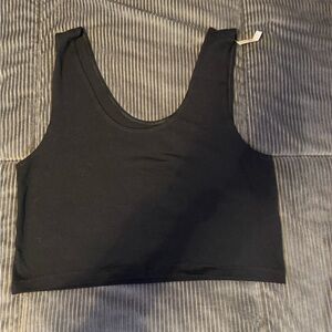 Pink cropped black tank top